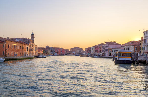View of Canale Ponte Lungo at sunset, Murano Island, Venice, Veneto, Italy.