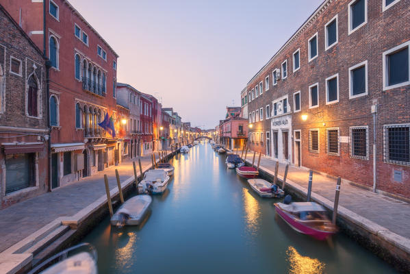 Dusk on Rio dei Vetrai, one of the canals of Murano Island, Venice, Veneto, Italy.