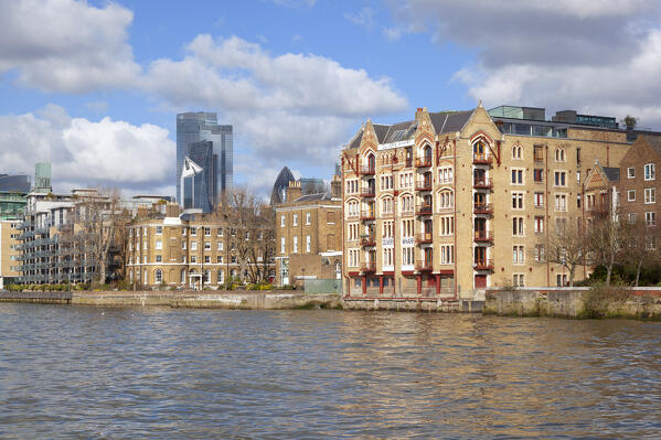 Oliver's Wharf building with City skyscrapers on the background, London, Great Britain, UK