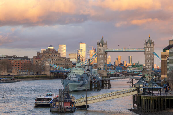 Tower Bridge and HMS Belfast from the Queen's Walk at sunset , London, Great Britain, UK