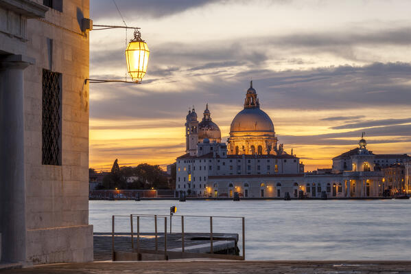 View of church of Santa Maria della Salute from San Giorgio Maggiore island at dusk, Venice, Veneto, Italy