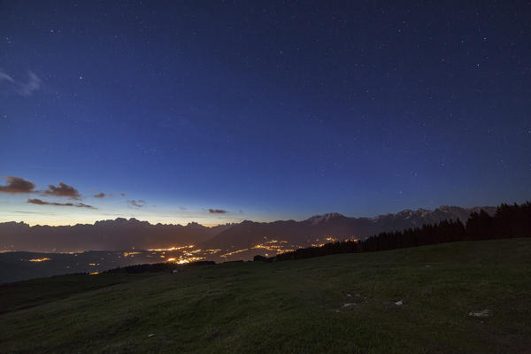 Night at Mezzomiglio Alm, Cansiglio, Belluno Prealps, Belluno, Italy.