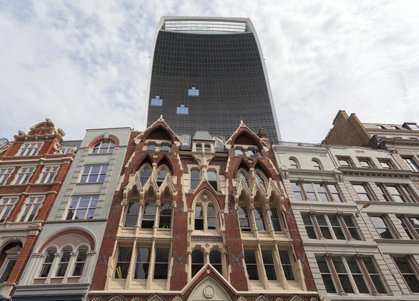 The skyscraper at 20 Fenchurch Street overhangs an victorian building in City of London, London, Great Britain, UK