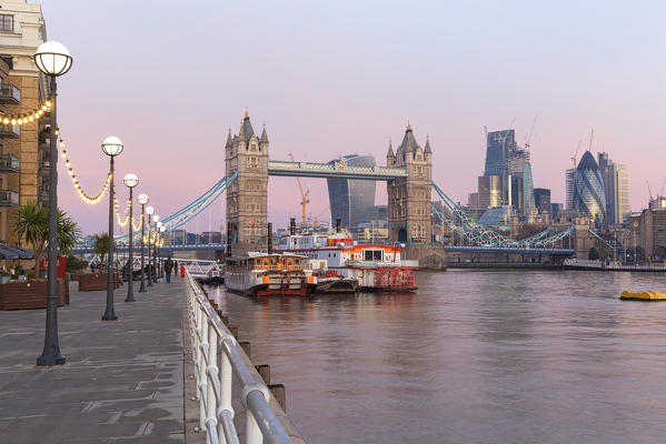 Tower Bridge and City of London from Butler’s wharf pier at dawn, London, Great Britain, UK
