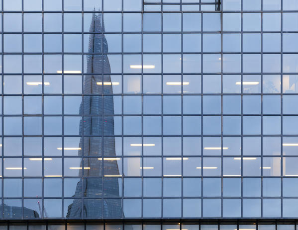 The skyscraper called Shard reflected on the windows of Northern & Shell Building, London, Great Britain, UK
