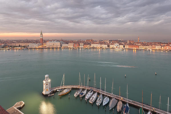 San Marco Square and the lighthouse of Venice dock from the bell tower of Abbey of San Giorgio Maggiore, Venice, Veneto, Italy