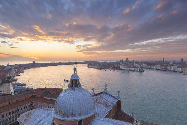 Elevated view of Abbey of San Giorgio Maggiore with with Giudecca Canal at sunset from the bell tower of San Giorgio Maggiore, Venice, Veneto, Italy