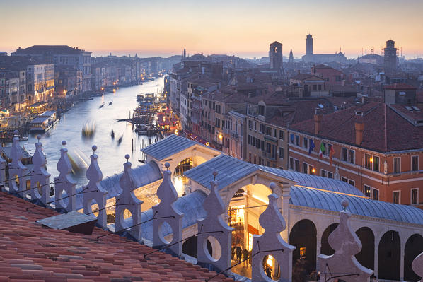 The view on Canal Grande and Rialto Bridge from panoramic terrace of Fondaco dei Tedeschi, Venice, Veneto, Italy