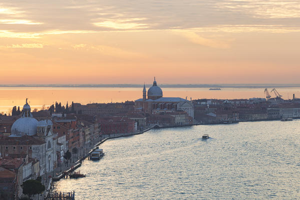 Sunset on Giudecca Island from the bell tower of San Giorgo Maggiore, Venice, Veneto, Italy.