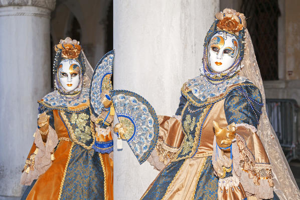 A couple of typical mask of Carnival of Venice at Ducal Palace, Venice, Veneto, Italy