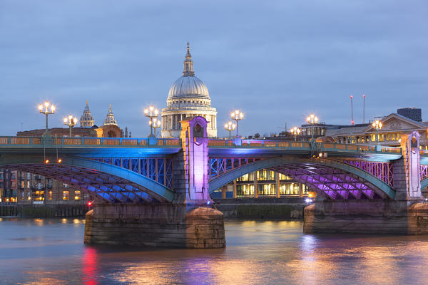 St. Paul’s Cathedral with Southwark Bridge at dusk, London, Great Britain, UK
