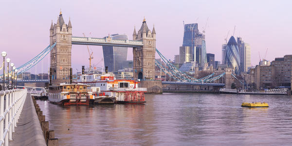 Tower Bridge and City of London from Butler’s wharf pier at dawn, London, Great Britain, UK