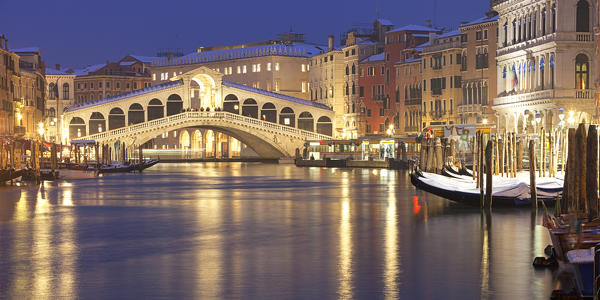 Rialto Bridge at dusk after a snowfall, Grand Canal, Venice, Veneto, Italy
