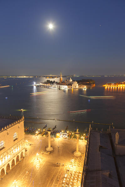 St. Mark's Square and St' Georges island seen from the top of St. Mark's Campanile by night, Venice, Veneto, Italy.