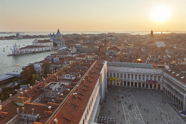 Santa Maria della Salute and St. Mark's Square seen from the top of St. Mark's Campanile at sunset, Venice, Veneto, Italy.