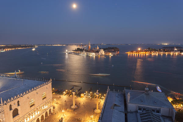 St. Mark's Square and St' Georges island seen from the top of St. Mark's Campanile by night, Venice, Veneto, Italy.