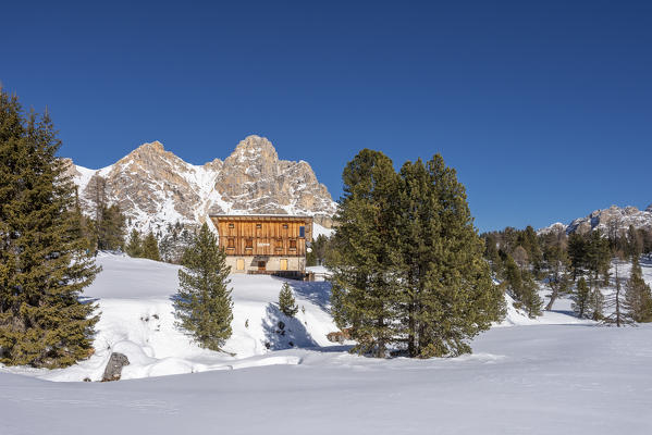 San Vigilio di Marebbe, Fanes, Dolomites, South Tyrol, Italy, Europe. The chalet Muntagnoles with the peak of Furcia dai Fers