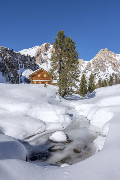 San Vigilio di Marebbe, Fanes, Dolomites, South Tyrol, Italy, Europe. The chalet Muntagnoles with the peak of Furcia dai Fers