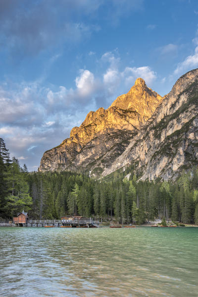 Braies / Prags, Dolomites, South Tyrol, Italy. The Lake Braies / Pragser Wildsee and the peak of Herrstein at sunset