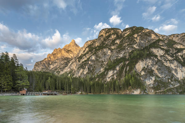 Braies / Prags, Dolomites, South Tyrol, Italy. The Lake Braies / Pragser Wildsee and the peak of Herrstein at sunset