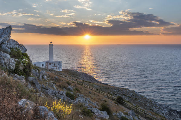 Otranto, province of Lecce, Salento, Apulia, Italy. Sunrise at the lighthouse Faro della Palascìa. This lighthouse marks the most easterly point of the Italian mainland.