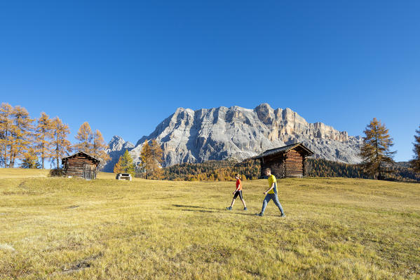 Alta Badia, Bolzano province, South Tyrol, Italy, Europe. Autumn on the Armentara meadows, above the mountains of the Neuner, Zehner and Heiligkreuzkofel