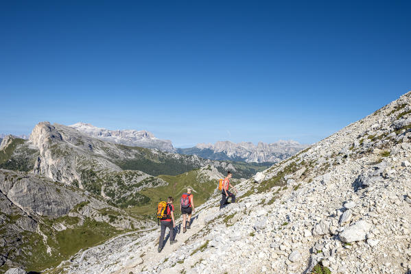 Falzarego Pass, Dolomites, province of Belluno, Veneto, Italy. Mountaineers approaching the via ferrata 