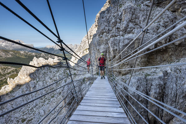 Falzarego Pass, Dolomites, province of Belluno, Veneto, Italy. Mountaineers on the via ferrata 