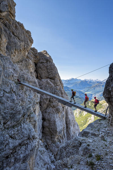 Falzarego Pass, Dolomites, province of Belluno, Veneto, Italy. Mountaineers on the via ferrata 