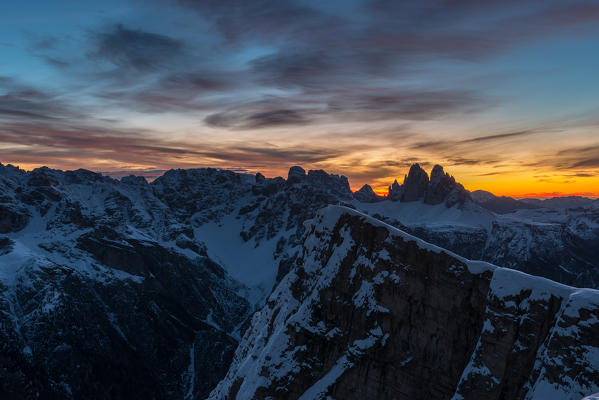 Piramide/Helltaler Schlechten, Dolomites, South Tyrol, Italy. Aurora over the Dolomites and the Tre Cime di Lavaredo.