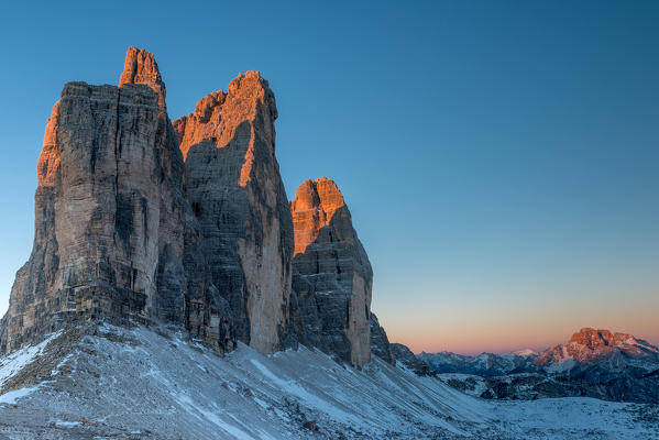 Tre Cime di Lavaredo/Drei Zinnen, Dolomites, South Tyrol, Italy. The first sun rays on the Tre Cime di Lavaredo/Drei Zinnen.