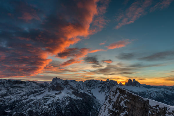 Piramide/Helltaler Schlechten, Dolomites, South Tyrol, Italy. Orange clouds over the Dolomites and the Tre Cime di Lavaredo. 