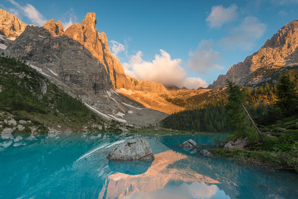 Sorapiss Lake, Dolomites, Veneto, Italy. Sunrise in the Sorapiss group. In the Sorapiss Lake reflected the Dito di Dio (God's Finger)