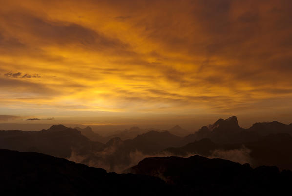 Cima Scalieret,Dolomites, Trentino, Italy.View over the Fassa Valley to the peaks of Sella, Tofane, Sorapiss, Antelao and Marmolada, 