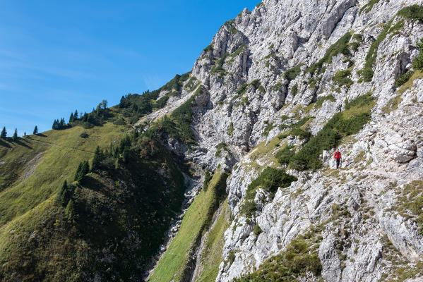 Cimonega, Dolomites, Veneto, Italy. Mountaineer on the Troi dei Caserin