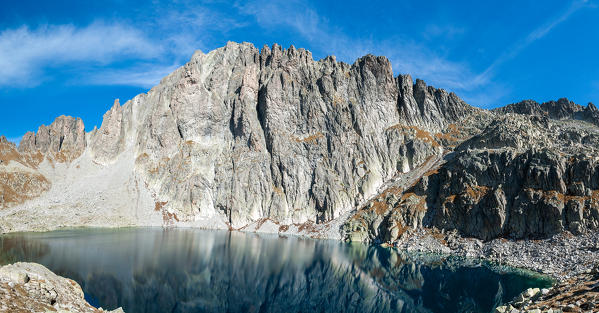 Cima d'Asta, Trentino, Italy. The Cima d'Asta (2847m). Under the rockwall the lake of Cima d'Asta