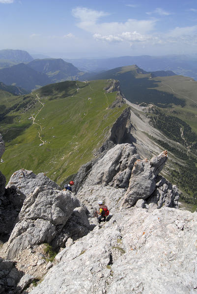 Odle, Dolomites, South Tyrol, Italy. Climbers in the rocks of the Piccola Fermeda