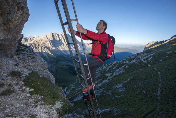 Odle di Eores, Dolomites, South Tyrol, Italy. The ladder from the via ferrata Guenther Messner. In the Background the Odle