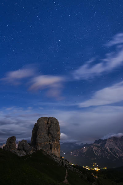 Cinque Torri, Dolomites, Veneto, Italy. Full moon night with stars over the peaks of Cinque Torri.