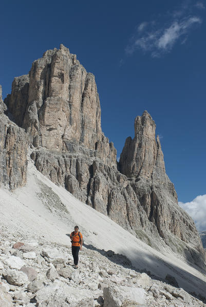 Colfosco, Dolomites, South Tyrol, Italy. Mountaineer in the Mesdi valley. 