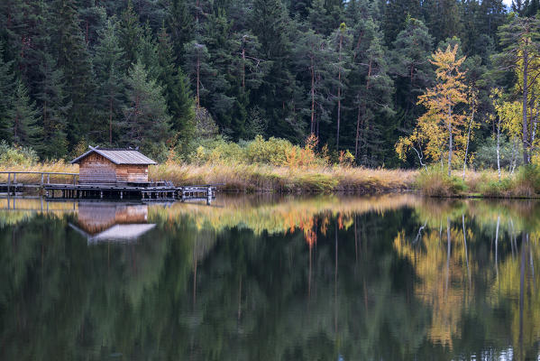 Fie, South Tyrol, Italy. Autumn at Lake Fie.
