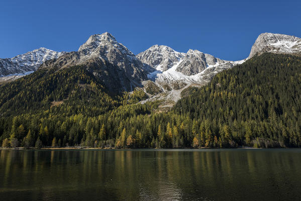 Anterselva, Antholz, South Tyrol, Italy. Autumn at the Lake of Anterselva/Antholzer See. In the background the Collalto/Hochgall