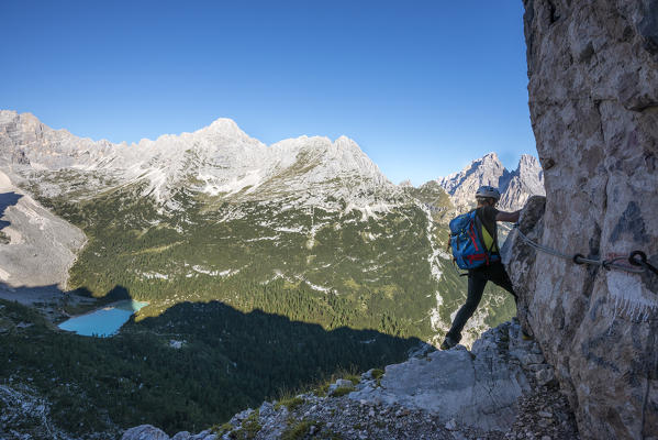 Sorapiss, Dolomites, Veneto, Italy. Climber on the via ferrata Vandelli