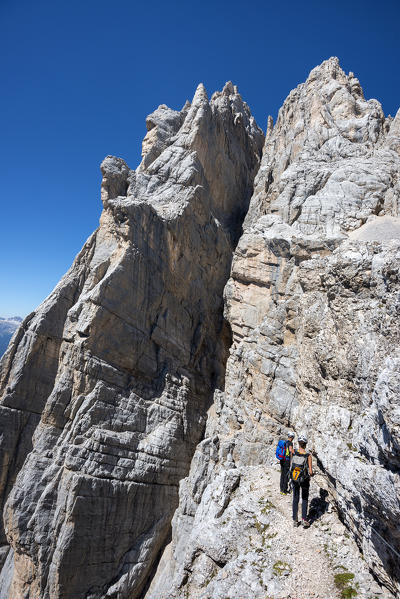 Sorapiss, Dolomites, Veneto, Italy. Climbers on the via ferrata Berti