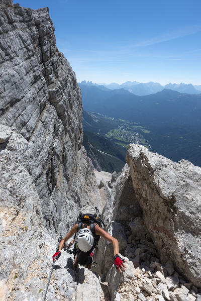 Sorapiss, Dolomites, Veneto, Italy. Climber on the via ferrata Berti