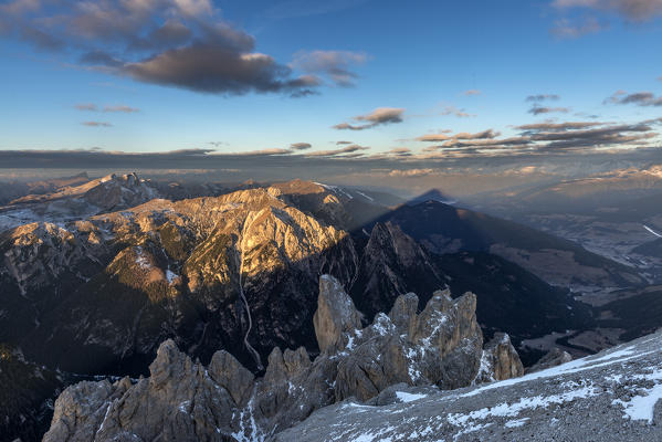 Picco di Vallandro, Dolomites, South Tyrol, Italy. The summit casts its shadow up in the Pustertal Valley