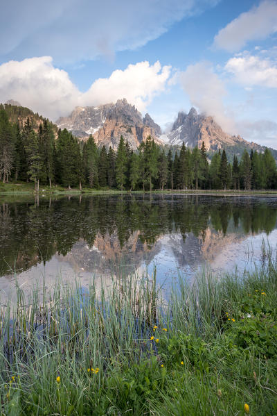Misurina, Dolomites, Veneto, Italy. The crags of Cadini group are reflected in the lago d'Antorno