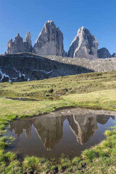 Sesto/Sexten, Dolomites, South Tyrol, Italy. The Tre Cime di Lavaredo/Drei Zinnen are reflected in a lake