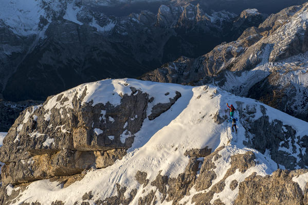 Picco di Vallandro, Prato Piazza, Dolomites, South Tyrol, Italy. Mountaineers on the ridge to the Picco di Vallandro