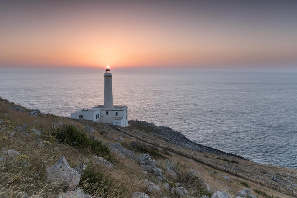 Otranto, province of Lecce, Salento, Apulia, Italy. Sunrise at the lighthouse Faro della Palascìa. This lighthouse marks the most easterly point of the Italian mainland.